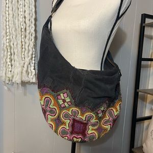Free People crossbody hobo jean/crochet bag. Oversized for lots of items.